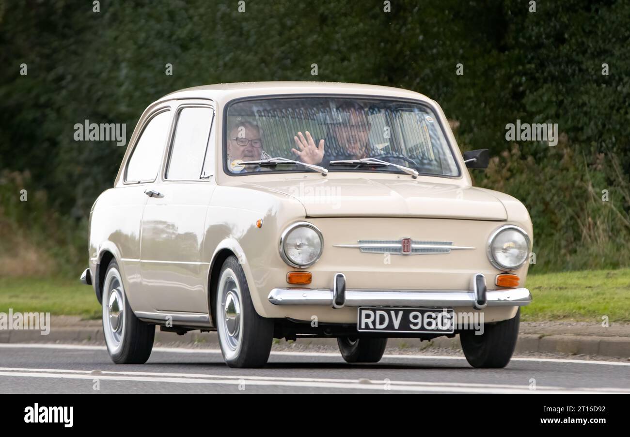 Bicester,Oxon.,UK - Oct 8th 2023: ``969 Fiat 850 classic car driving on an English country road. Stock Photo